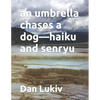 An umbrella chases a dog-haiku and senryu - Paperback