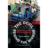 The Devil Behind the Mirror: Globalization and Politics in the Dominican Republic - Paperback